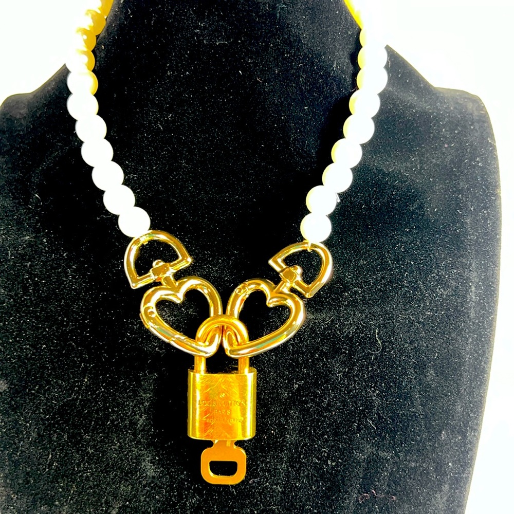Pearl and gold tone necklace with Authentic Louis Vuitton lock and key